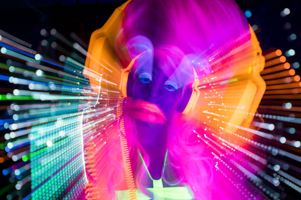 istock Female dancing in glow UV costume 1623508092