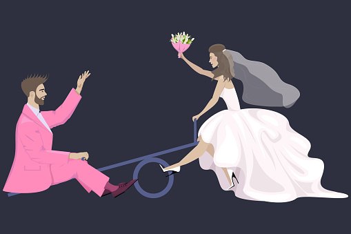 Happy newlyweds, the bride and groom are having fun at their wedding, riding on a swing on a dark background
