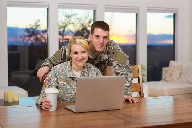 istock Military couple looking at a laptop 162352656