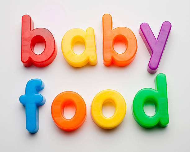 baby food - magnetbuchstabe stock-fotos und bilder