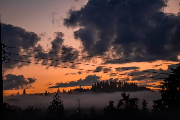 istock Dramatic dark sky with power lines running through the landscape 1623532583