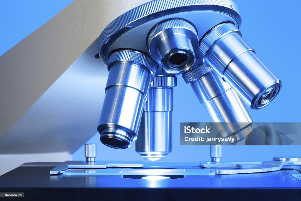 Macro of microscope with slide Detail of microscope with slide. Biology Stock Photo