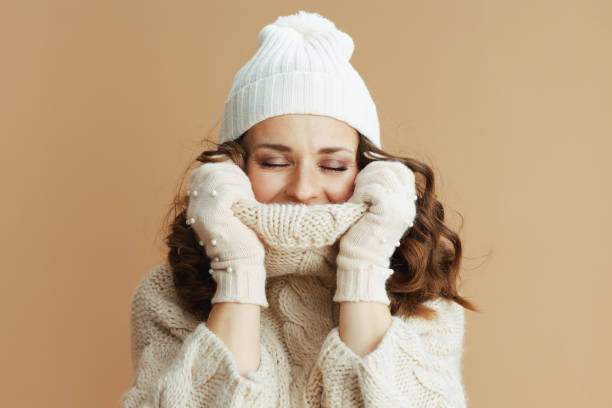 istock relaxed elegant woman on beige background wrapped in collar 1623568416