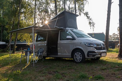 Usedom, Germany - 13 August, 2022: Motorhome Volkswagen California Ocean parked on a grass. Today is a very popular medium-size camper vehicle in Europe.