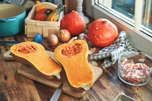 Preparing Fresh Butternut Pumpkins for Roasting in the Oven