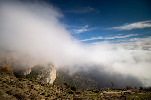 the beautiful tavertet mountain landscape covered in fog, catalunya, spain