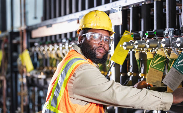 istock Worker inspecting industrial refrigeration equipment 1623611517