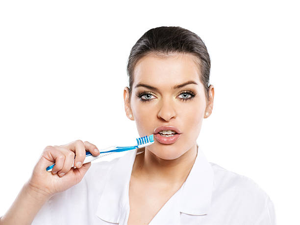 istock attractive woman with tootbrush 162361724