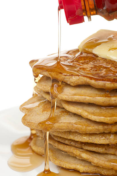 istock Part of Stack of Pancakes with Syrup Running Down 162362076