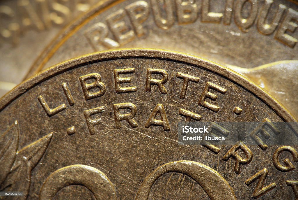 Primer plano de la palabra "libertad'en 20 Centimes moneda - Foto de stock de Amistad libre de derechos