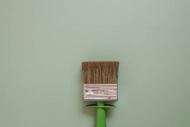 istock Repair brush on a green background top view, space for your text 1623656411