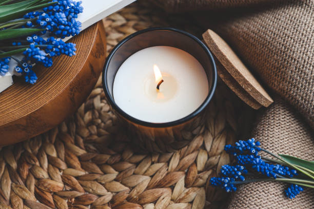 istock Candle and flowers in home atmospheric interior 1623705070