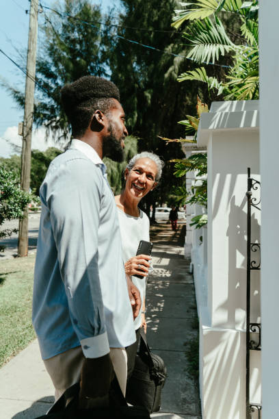 istock Coworkers walking and talking outdoors 1623711761
