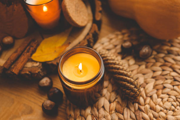 istock Thanksgiving autumn decor, burning candle, pumpkins and candles 1623723121