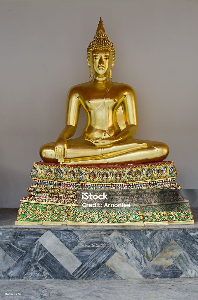 Buddha statue in Wat Pho Temple. Wat pho is among the best known of Thailand's landmarks. Art Stock Photo