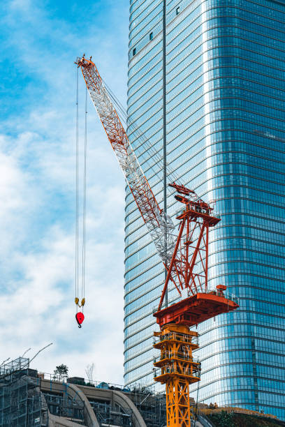 istock Construction with cranes in Tokyo City 1623829347
