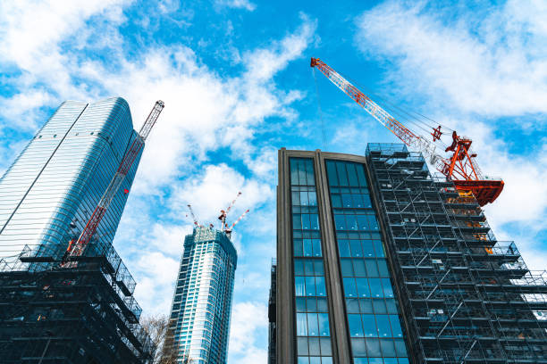 istock Construction with cranes in Tokyo City 1623831494