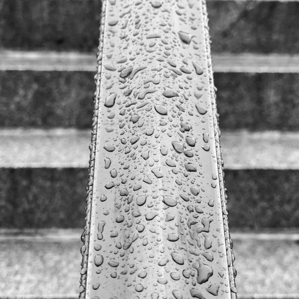 Raindrops On a Stairway Banister stock photo
