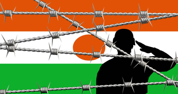 istock Niger flag and barbed wire. Military concept. 1623966366