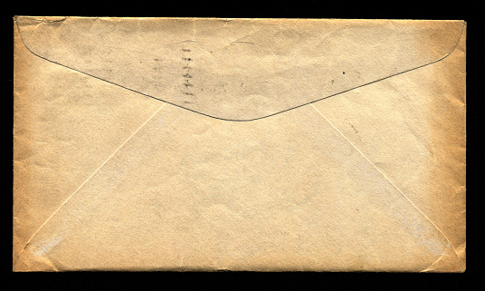 Old envelope on black - high resolution scan