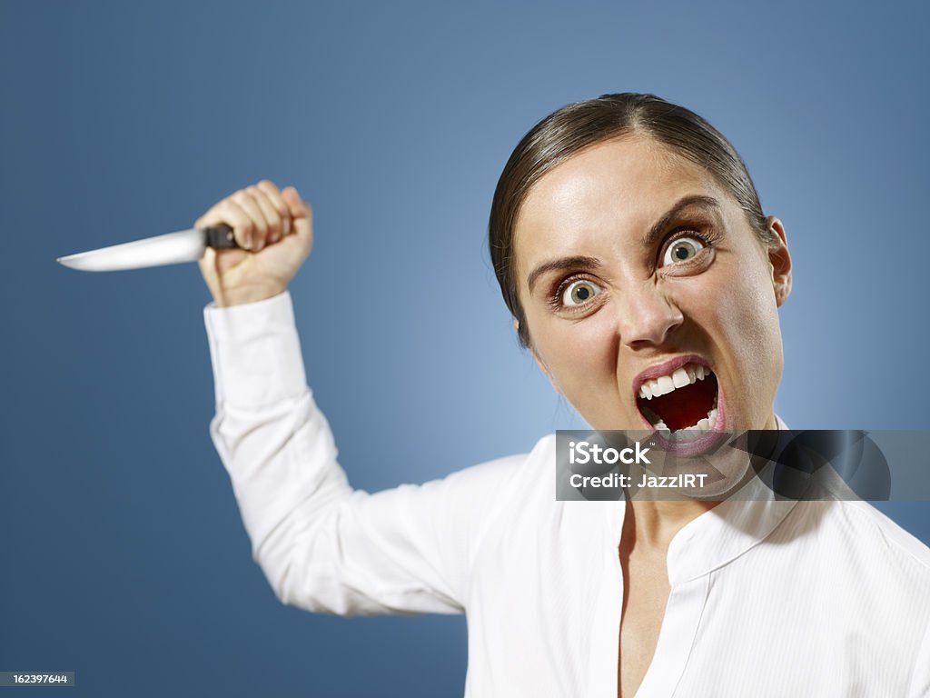 Angry Mulher de negócios com uma faca. - Royalty-free Faca - Armamento Foto de stock