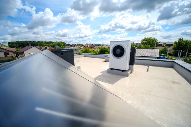 istock Heat pump and solar collector on the roof 1623978816