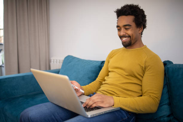 istock Young fashionable man working at home 1624001447
