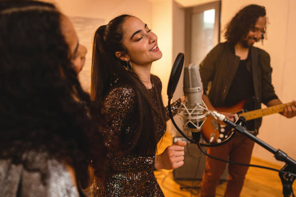istock Diverse Band Recording A Song In A Cosy Recording Studio 1624019715