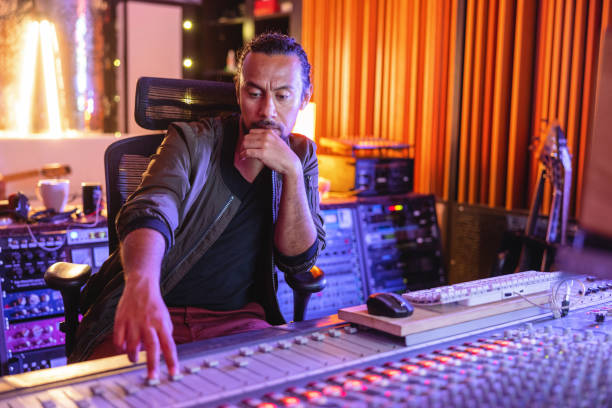 istock Serious Black Male Audio Engineer Working On Sound Adjustments In A Recording Studio 1624019734