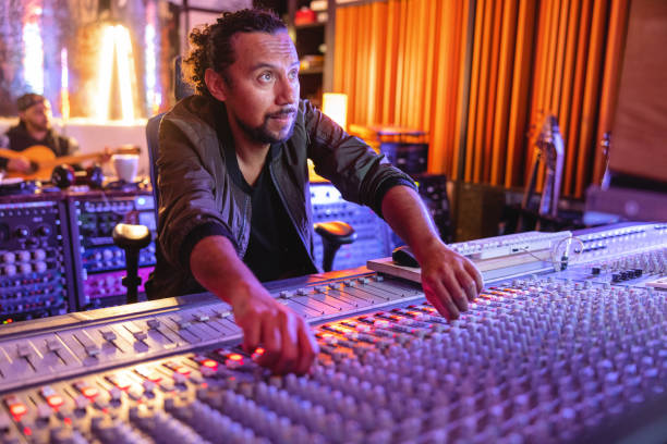 istock Black Male Audio Engineer Recording A Song In A Recording Studio 1624019738