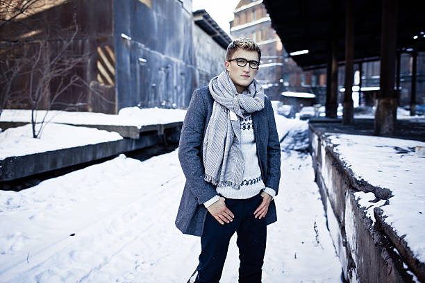 istock Stylish man in a jacket, sweater, scarf and glasses 162406983