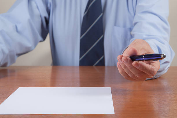 istock Man with Pen and Sheet in the Office 162407322