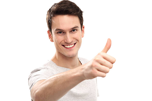 istock Young man showing thumbs up 162407373