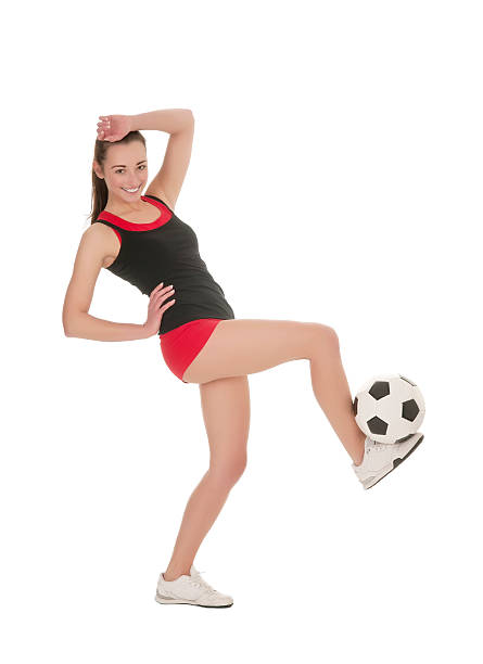 istock woman playing with soccer ball 162412361