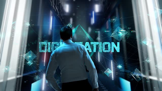Digitization. Man in Futuristic Office Interior Moving and Activating Hologram.