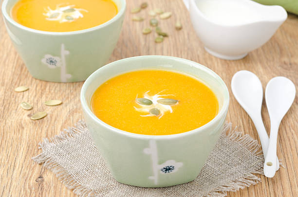 istock two bowls of pumpkin soup with ginger horizontal 162412589