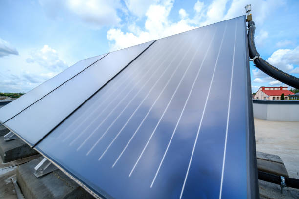 istock Heat pump and solar collector on the roof 1624136733