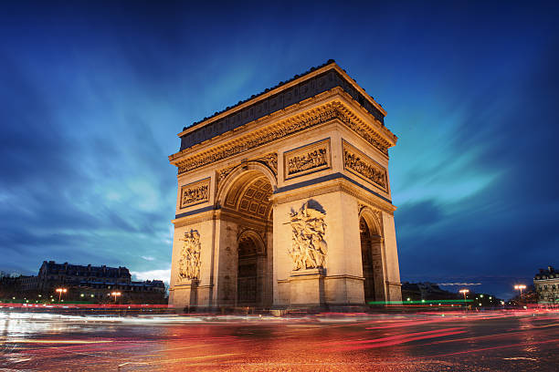 istock Arc de Triomphe in Paris at sunset with blurred cars 162413792