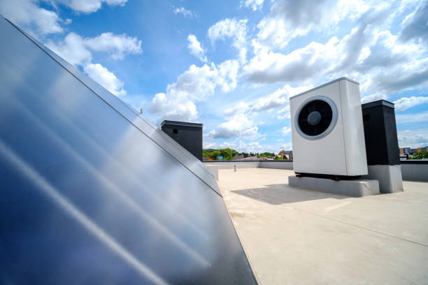 istock Heat pump and solar collector on the roof 1624144151
