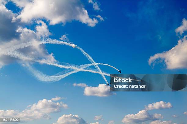 Air Dogfight On Airshow Stock Photo - Download Image Now - Airshow, Aerial Dogfight, Fighter Plane