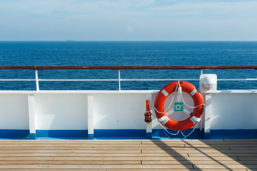 Wooden wharf,buoy and blue Sky on Cruise Ship