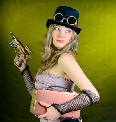 Steampunk girl with pistol  and small suitcase  to look back