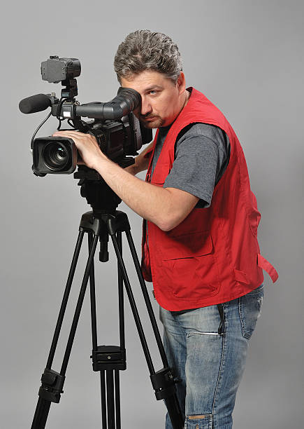 istock Cameraman in red vest 162419334