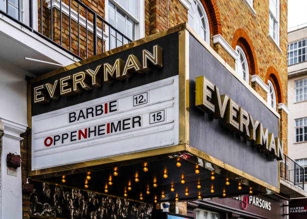 Barbenheimer - Barbie And Oppenheimer Movies Marquees At Everyman Cinema, Marylebone, London, United Kingdom - 2023 Captured at the Everyman Cinema on Baker Street in Marylebone, London, UK.

Location: 96-98 Baker St, Marylebone, London W1U 6TJ, United Kingdom - Marylebone is a chic residential area with a village feel, centred on the indie boutiques and smart restaurants of Marylebone High Street.

‘Barbenheimer’ boosts cinema chain Everyman with record week in the UK.
The Everyman Cinemas company said earnings had doubled in July: Cinema chain Everyman saw its earnings double last month thanks to the release of the Barbie and Oppenheimer films, as it racked up a record week of admissions. showtime stock pictures, royalty-free photos & images
