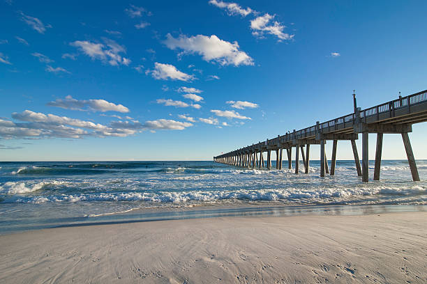 Waves hit Pensacola Pier stock photo