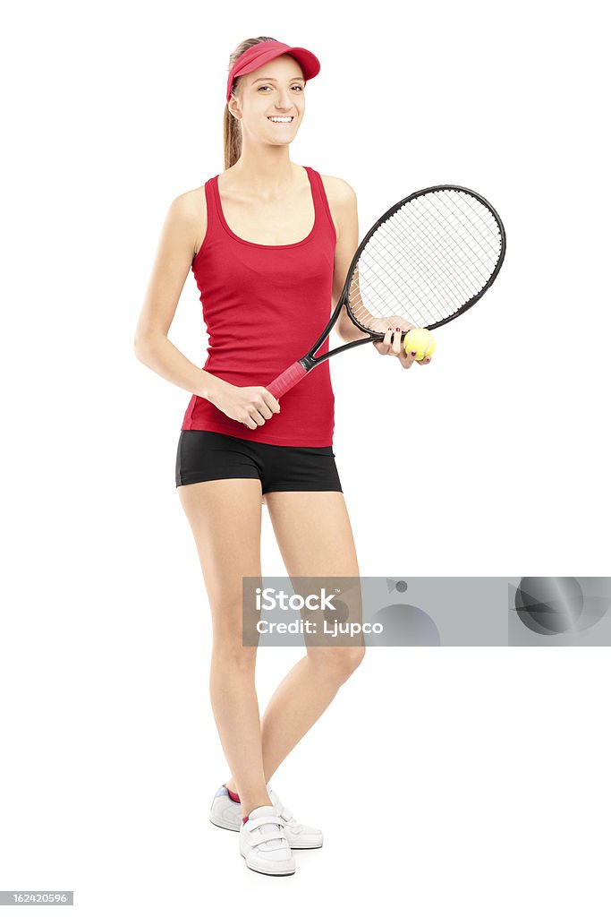 Sorrindo feminino segurando a raquete de tênis e bola - Foto de stock de Tênis - Esporte de Raquete royalty-free