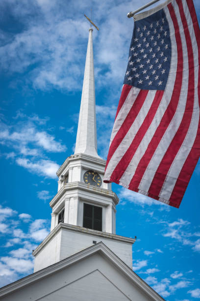 istock Stowe Community Church with American Flag 1624217122