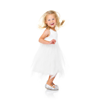 A picture of a little ballerina dancing over white background
