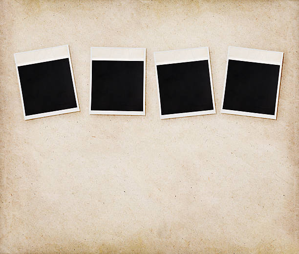 istock Empty instant photos on old paper texture 162422790