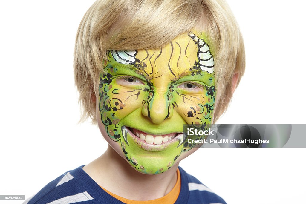 Young boy con pintura facial monster - Foto de stock de Niño libre de derechos